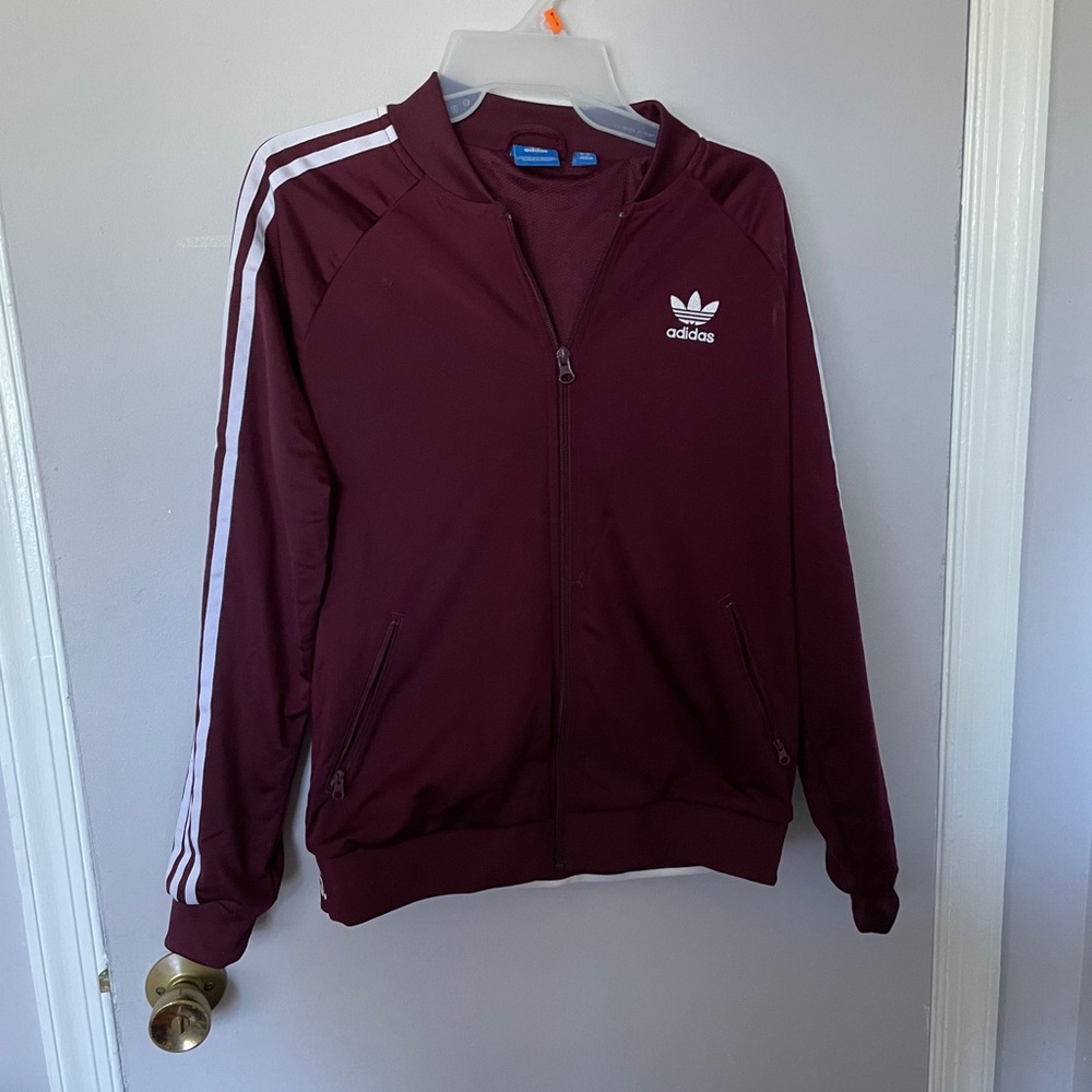 Two pieces Addis’s maroon tracksuit
